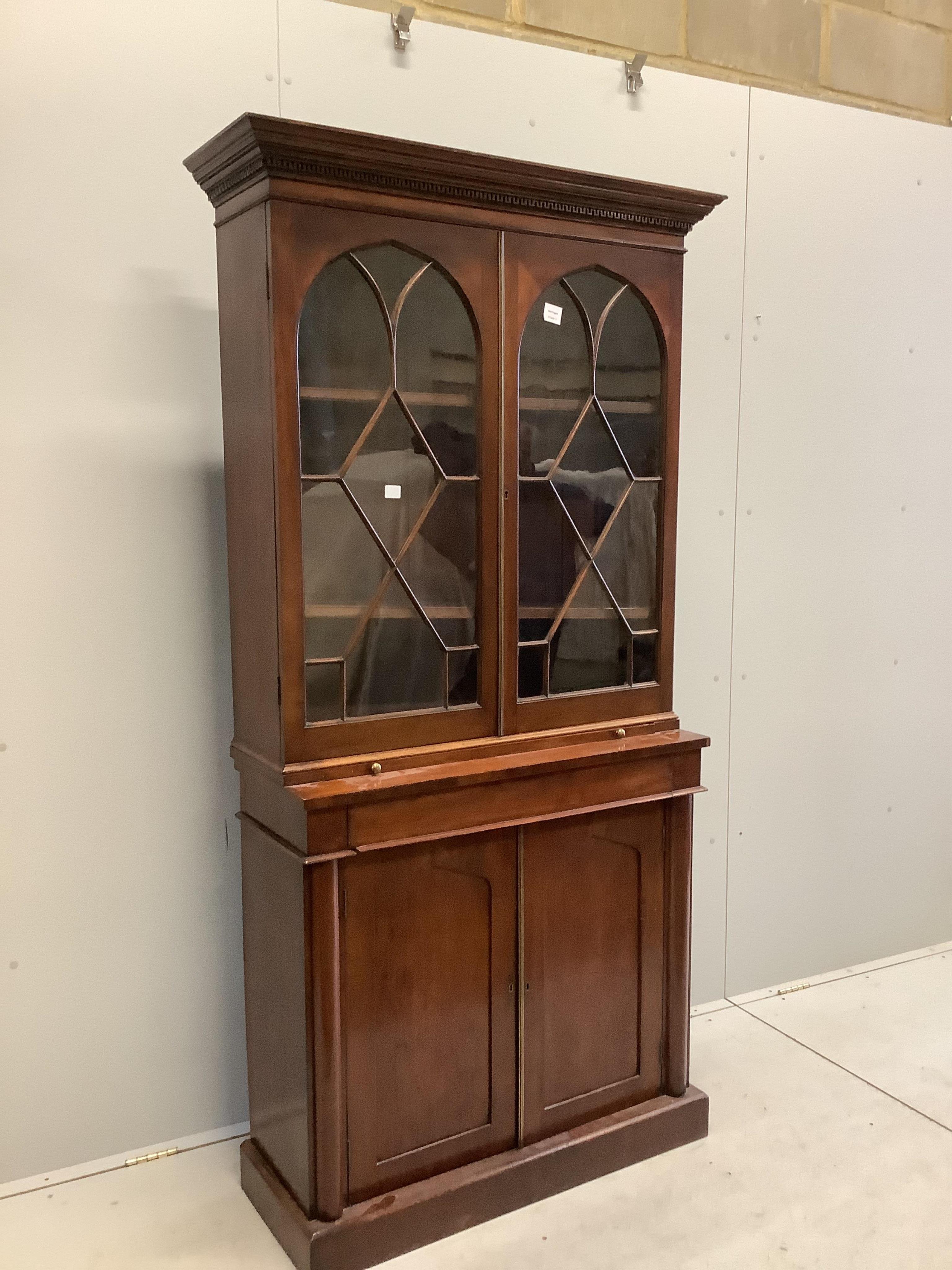 A Victorian mahogany chiffonier bookcase, width 91cm, depth 37cm, height 186cm. Condition - fair